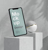 Smartphone Mock-Up Presentation With Stone And Metallic Elements Psd