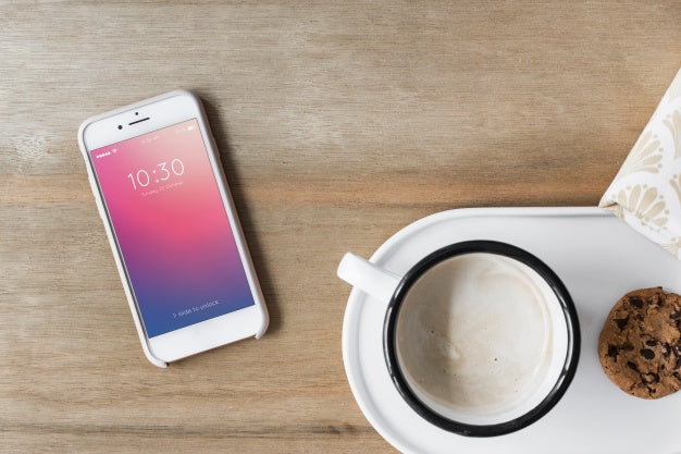 Smartphone Mockup Next To Coffee Psd