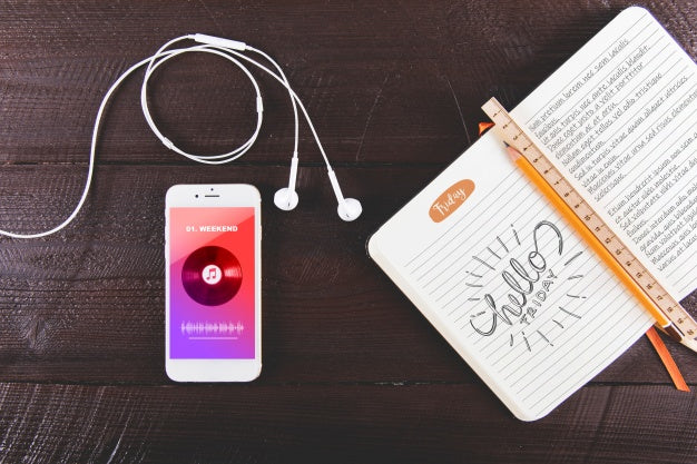 Smartphone Mockup Next To Open Book Psd