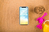 Smartphone Mockup On Sand Psd