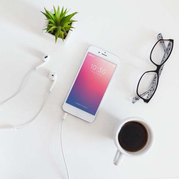 Smartphone Mockup With Charging Cable And Earphones Psd