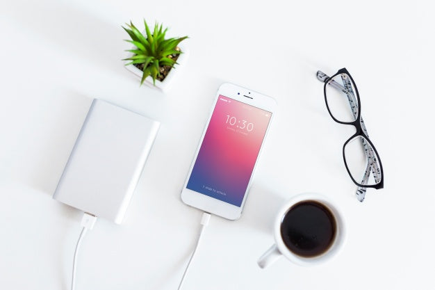 Smartphone Mockup With Charging Cable And Earphones Psd