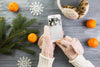 Smartphone Mockup With Christmas Decoration Psd