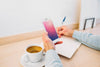 Smartphone Mockup With Coffee On Desk Psd