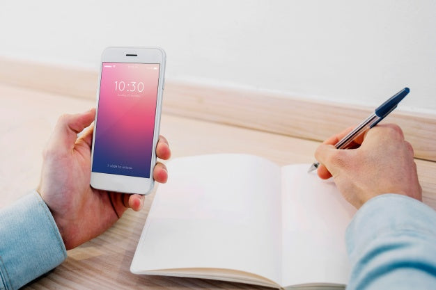 Smartphone Mockup With Open Book Psd