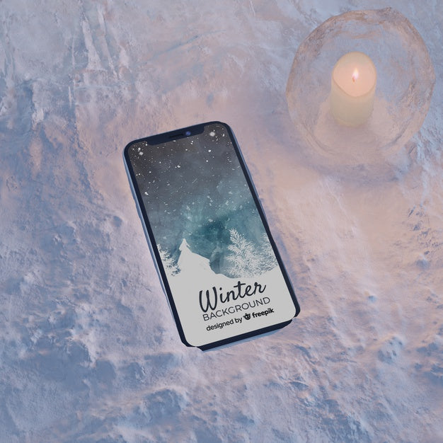Smartphone On Ice Block Light By Candle Psd