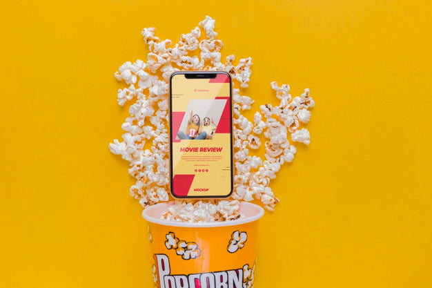 Smartphone On Popcorn Arrangement Psd
