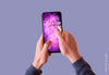 Smartphone Two Hands On Purple Background Mockup Psd