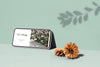 Smartphone With Shadow And Flowers Psd