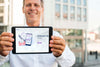 Smiley Businessman Outdoors Holding Horizontal Digital Tablet Psd