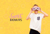 Smiley Child Posing With Donuts Over Eyes Psd