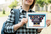 Smiley Girl Holding A Tablet Mock-Up Psd
