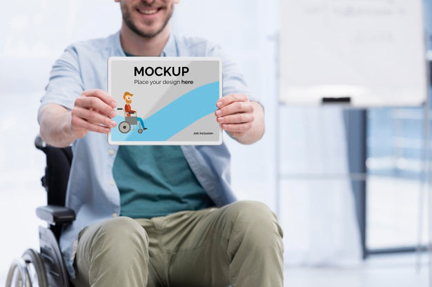 Smiley Man In Wheelchair At Work With Copy Space Psd