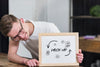 Smiley Man With Glasses Holding Mock-Up Frame Psd