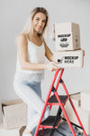 Smiley Woman Holding Boxes Psd