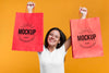 Smiley Woman Holding Shopping Bags Mock-Up Psd