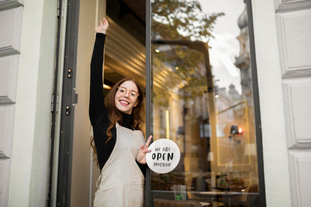 Smiley Woman Working At A Restaurant Standing Next To The Door Psd
