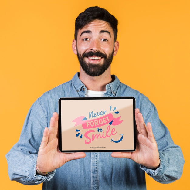 Smiling Bearded Man Presenting A Tablet Mock Up Psd