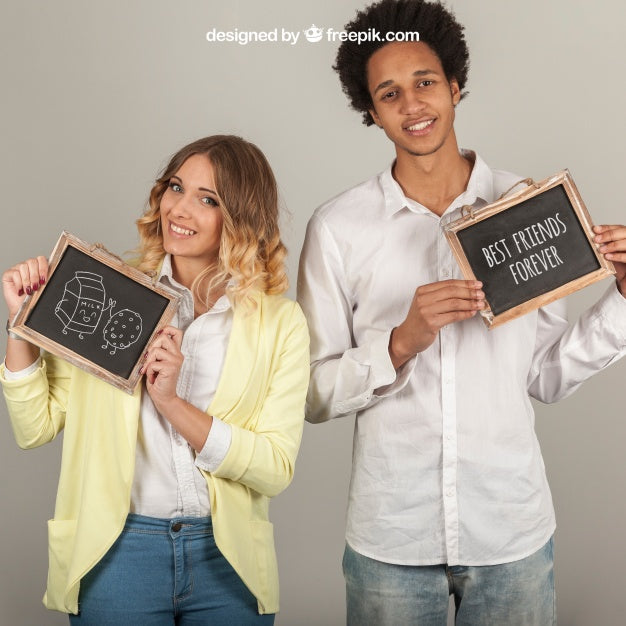 Smiling Couple Holding Slates Psd
