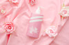 Soap Bottle On Pink Fabric Background Psd