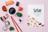 Soya Sauce And Sushi Rolls With Notebook Psd