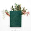 Spring Concept Mockup With Book On Leaves Psd