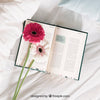 Spring Concept Mockup With Flowers In Book Psd