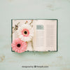 Spring Concept Mockup With Flowers In Open Book Psd