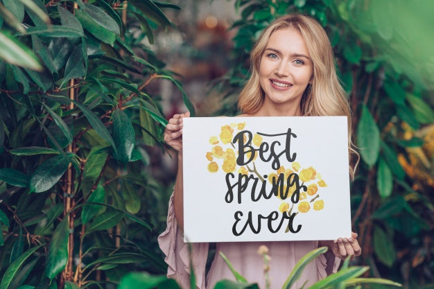 Spring Concept With Woman Holding Paper Mockup Psd