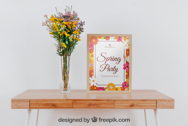 Spring Mockup With Frame And Vase Of Flowers Over Table Psd