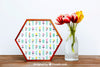 Spring Mockup With Hexagonal Frame And Vase Of Flowers Psd