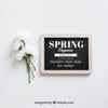 Spring Mockup With White Flowers Next To Slate Psd