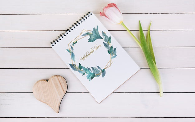 Spring Notebook Mockup With Decorative Plant In Top View Psd