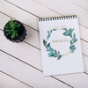 Spring Notebook Mockup With Decorative Plant In Top View Psd