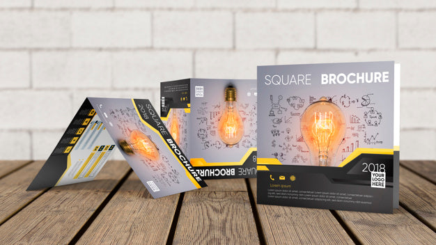 Square Brochure Mockup On Wooden Surface Psd