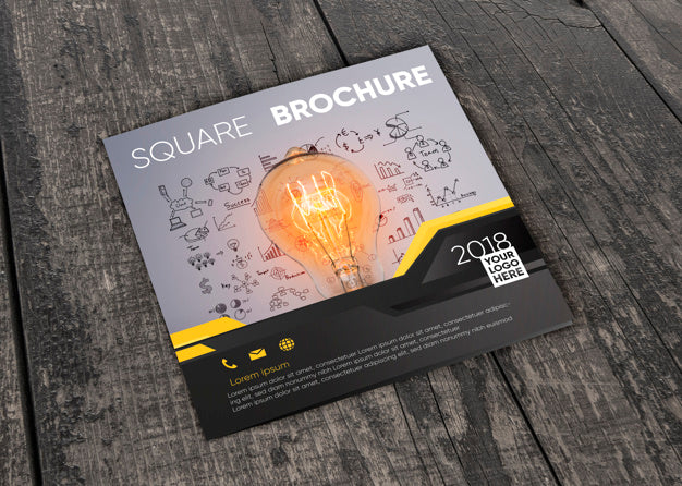 Square Brochure Mockup On Wooden Surface Psd