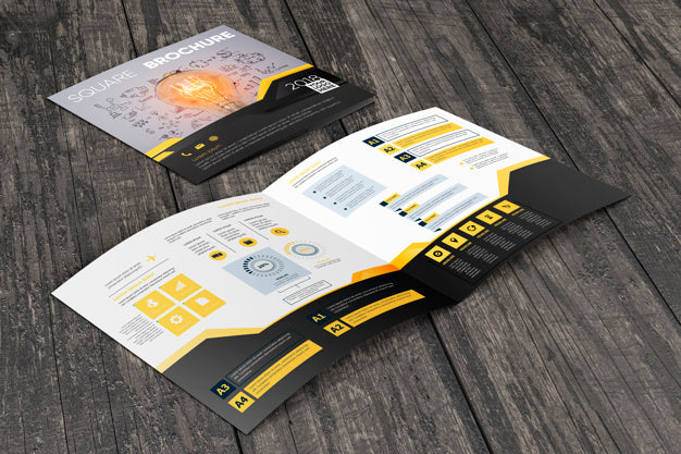 Square Brochure Mockup On Wooden Surface Psd