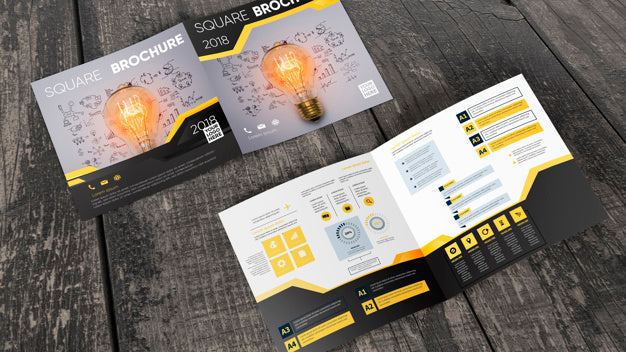 Square Brochure Mockup On Wooden Surface Psd