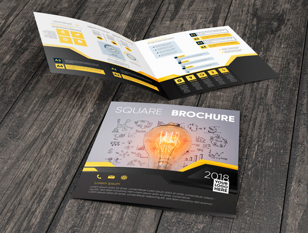 Square Brochure Mockup On Wooden Surface Psd