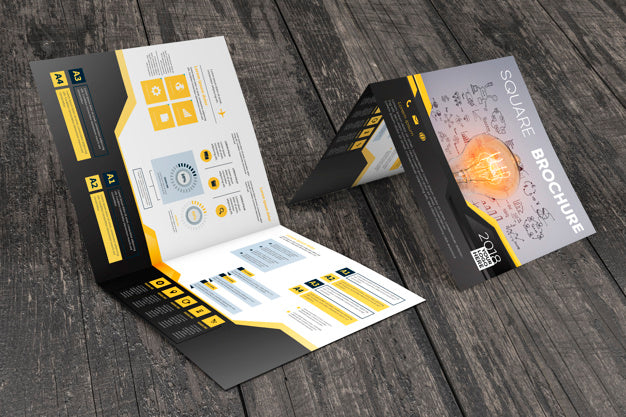 Square Brochure Mockup On Wooden Surface Psd