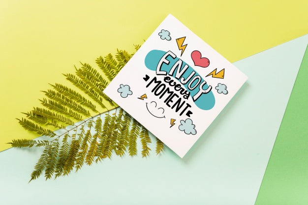 Square Card Mockup With Tropical Leaves Psd