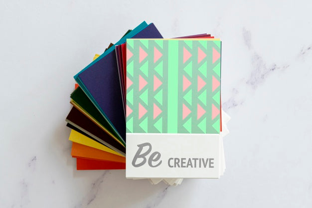 Stack Of Agendas On Desk Mock-Up Psd