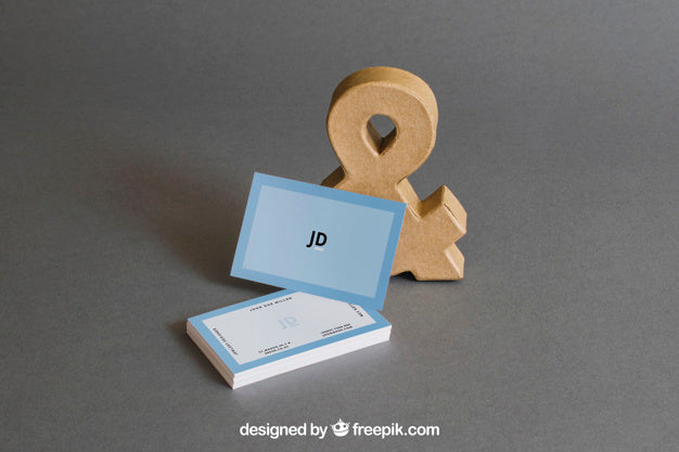 Stationery Mockup With Business Cards In Front Of Ampersand Psd