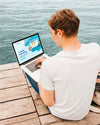 Student Enjoying Working Online Outdoors Psd