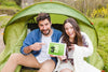 Summer Camp Mockup With Couple Pointing At Tablet Psd