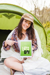 Summer Camp Mockup With Woman Pointing At Tablet Psd