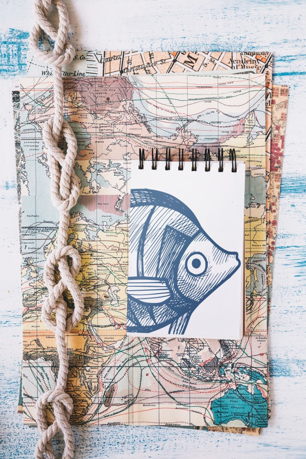 Summer Mockup With Notepad On Map Psd