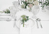 Table Prepared To Eat With Cutlery And Decorative Flowers Psd