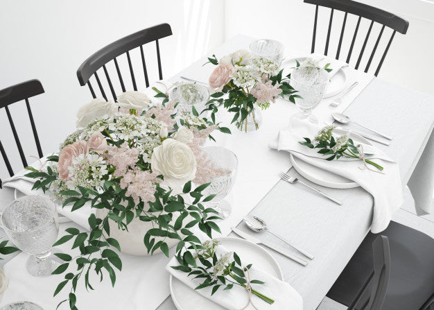 Table Prepared To Eat With Cutlery And Decorative Flowers Psd