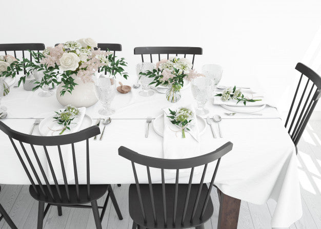 Table Prepared To Eat With Cutlery And Decorative Flowers Psd